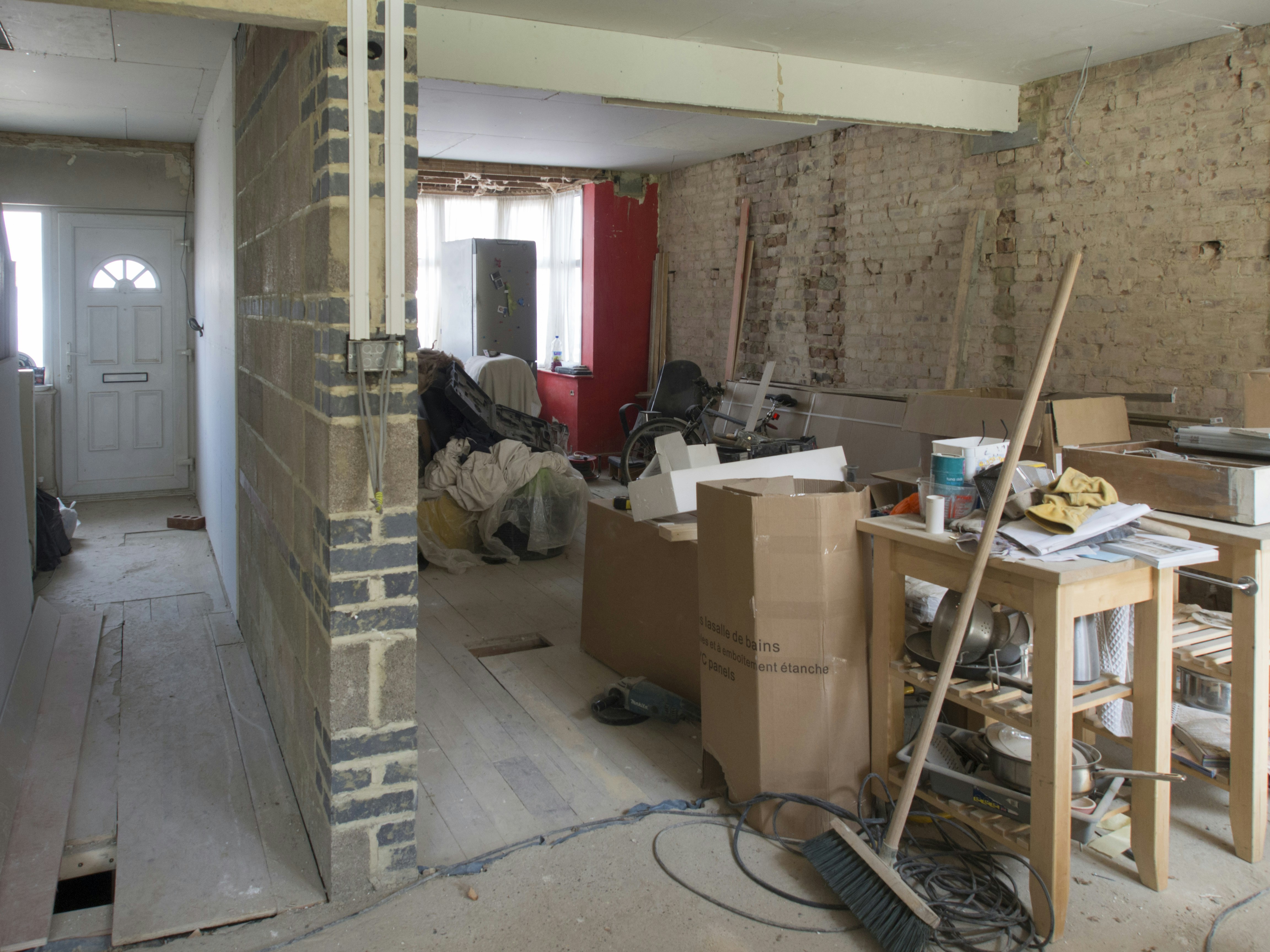 Professional home exterior renovation work in progress